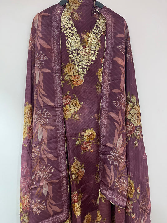 Organza silk suit paired with organza duputta