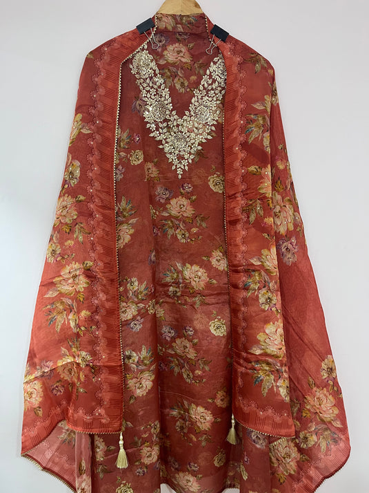 Organza silk suit paired with organza duputta