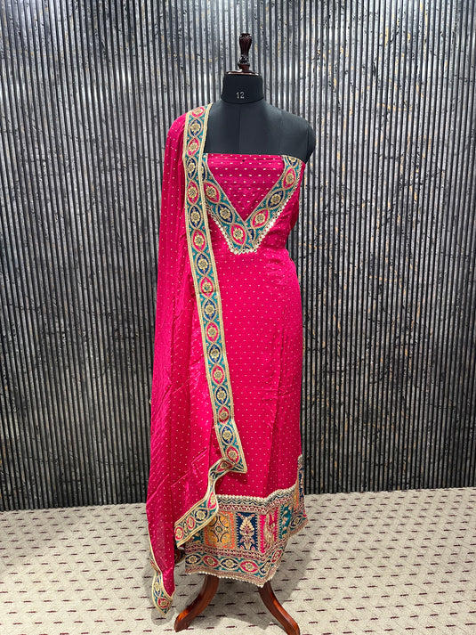 Majenta silk suit set with intricate ghera embroidery