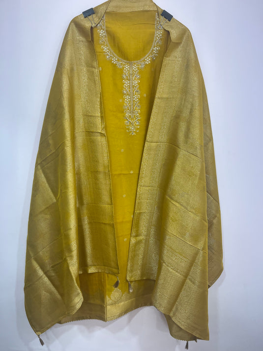 Self Weaving Suit Set with Detailed Weaving on Ghera & Paired with All-Over Self Woven Dupatta in Vibrant Colours