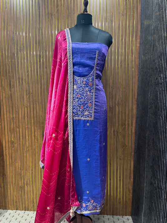 Elegant silk suit set with vibrant contrast duputta