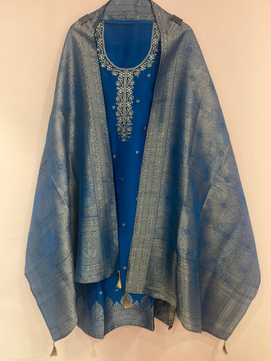 Self Weaving Suit Set with Detailed Weaving on Ghera & Paired with All-Over Self Woven Dupatta in Vibrant Colours