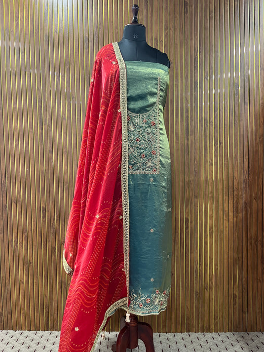 Elegant silk suit set with vibrant contrast duputta