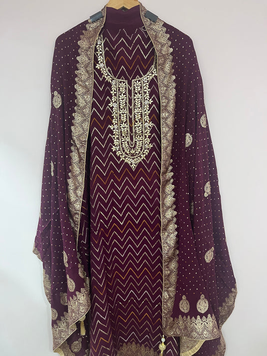 Premium silk suit featuring beautiful neck detailing