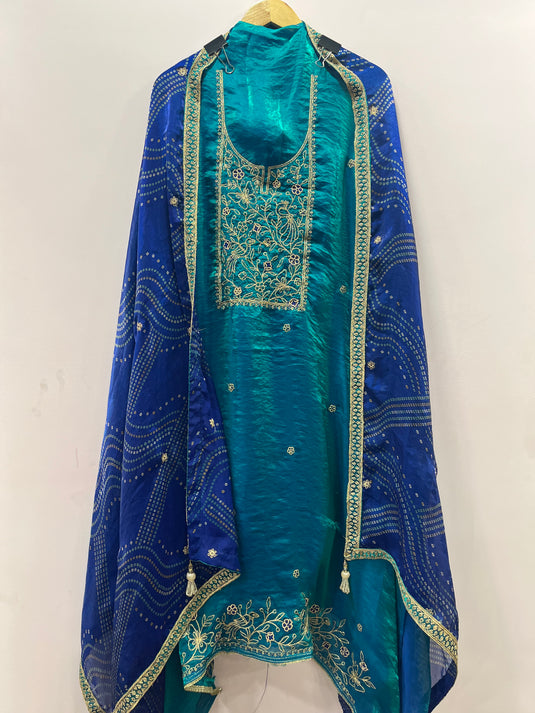 Elegant silk suit set with vibrant contrast duputta