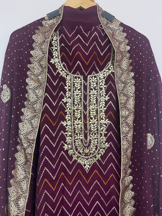 Premium silk suit featuring beautiful neck detailing